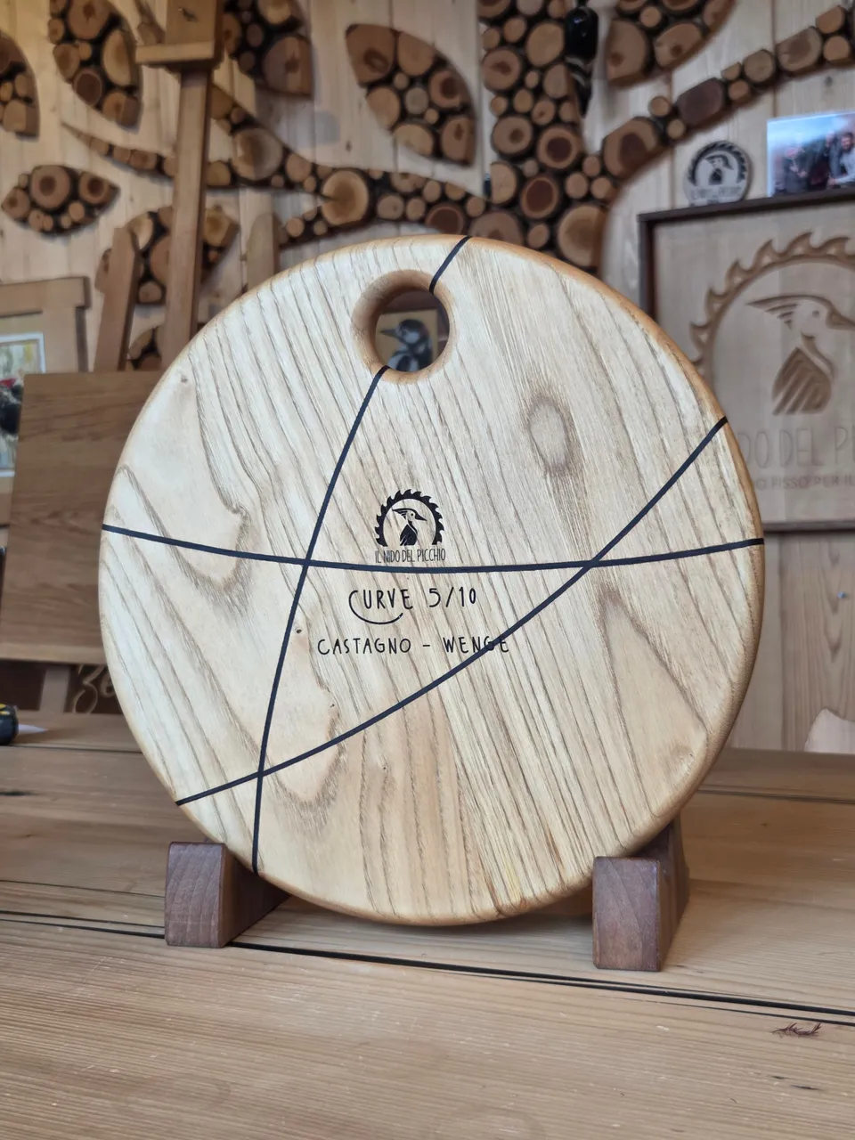 Il nido del picchio Curve tagliere rotondo castagno wenge